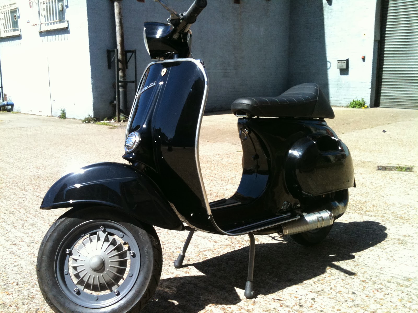 A restored Vespa ET3 in beautiful black paint